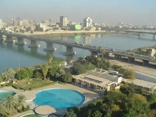 Which river runs through Baghdad?
