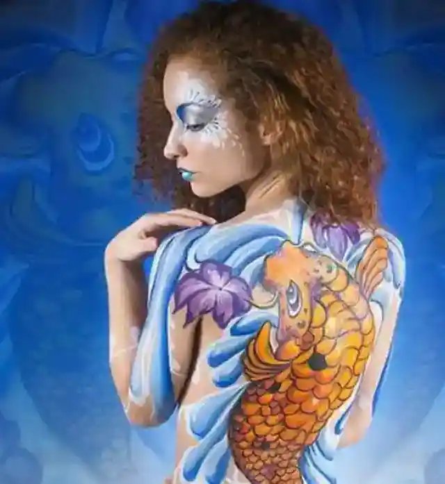 4. Swimming with Koi: A Living Pond