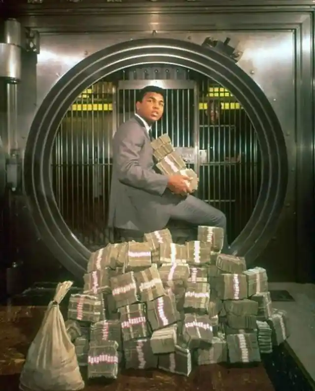 Muhammad Ali In 1974 Standing With His Winnings