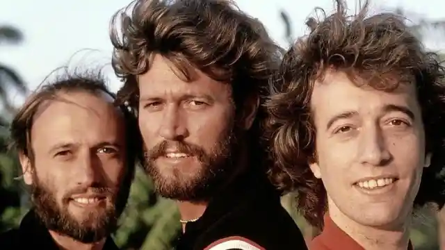 Which song was a Bee Gees chart-topping hit?