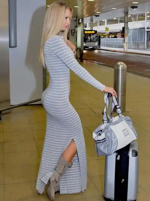 Her Outfit... Matches Her Luggage!