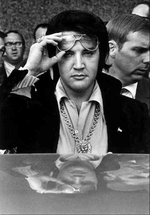 Elvis Presley Rocking The Gold Glasses And Lion Pendant - 1971