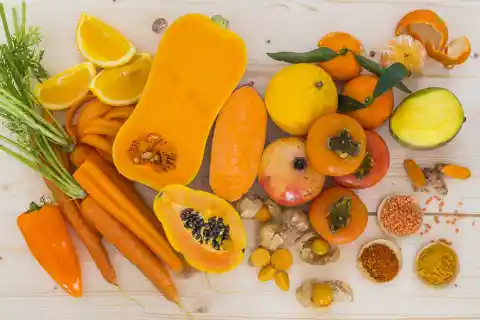 Which food can actually turn a person's skin orange, in large amounts?